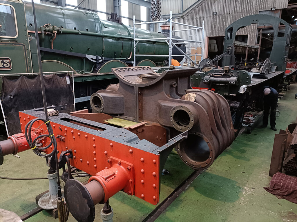 The chassis of 7802 Bradley Manor seen at Tyseley Locomotive Works with the new cylinder blocks undergoing trial fitment Photo: Chris Field